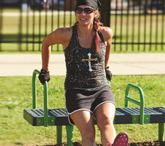 Woman working out on a Bench Dip Machine